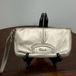Coach silver clutch bag with wristband
